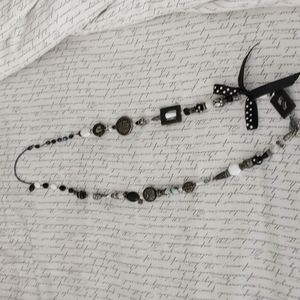 36" over the head hand beaded black and white necklace. 18" drop
